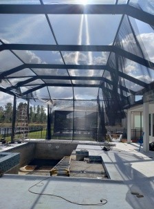 Aluminum screen enclosure and outdoor living project by Action Aluminum & Screen